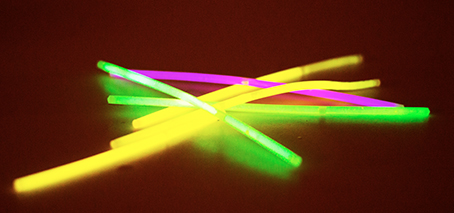 What are glow sticks, and what's the chemical reaction that makes them light  up?